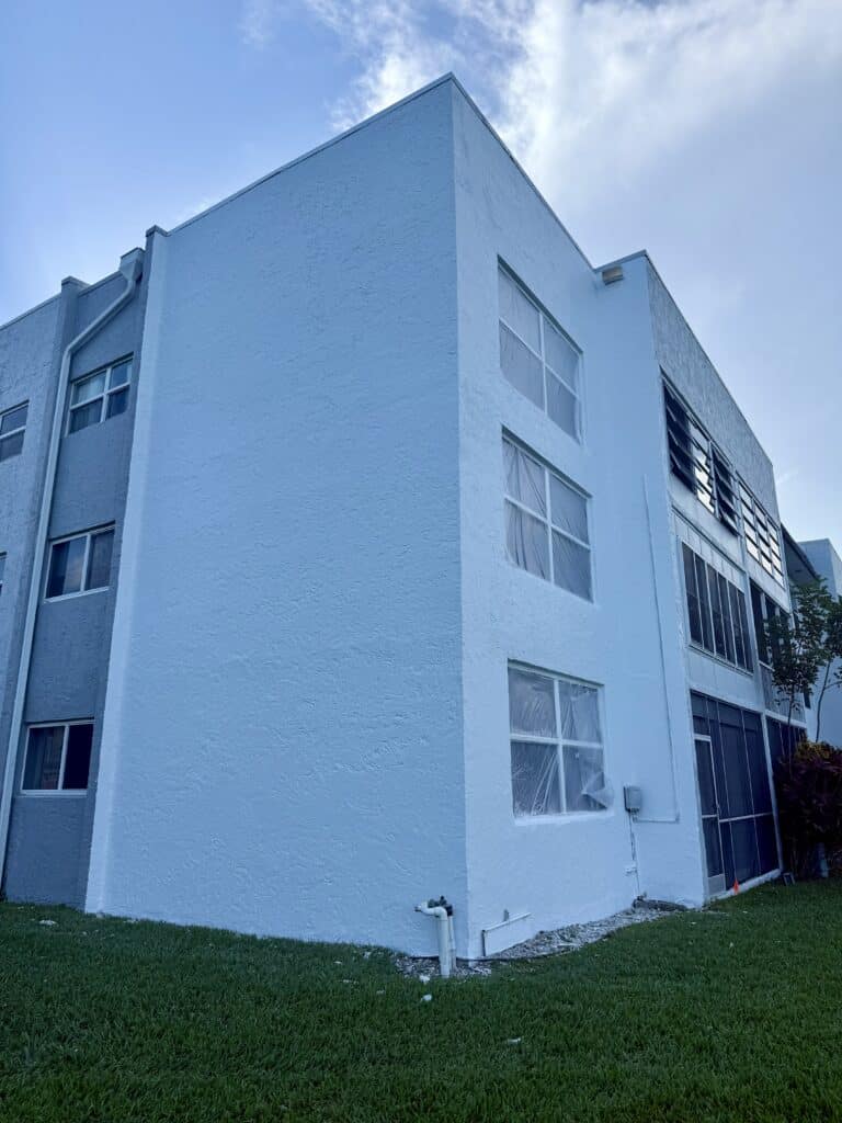 Final transformation featuring an impenetrable elastomeric waterproofing barrier system and premium paint.specialized plastic film to control moisture loss and maximize concrete curing strength.